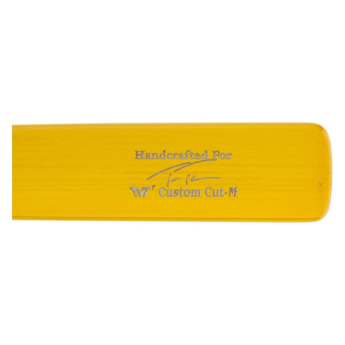 Close-up of a yellow baseball bat with Handcrafted For text, a signature, and W7 Custom Cut-M inscription.