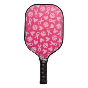 Front view of a pink pickleball paddle with a pattern of ribbons, hearts, and pickleballs.