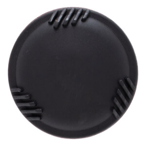 Top-down view of the circular black plastic end cap featuring three sets of raised parallel ridges spaced around its perimeter.