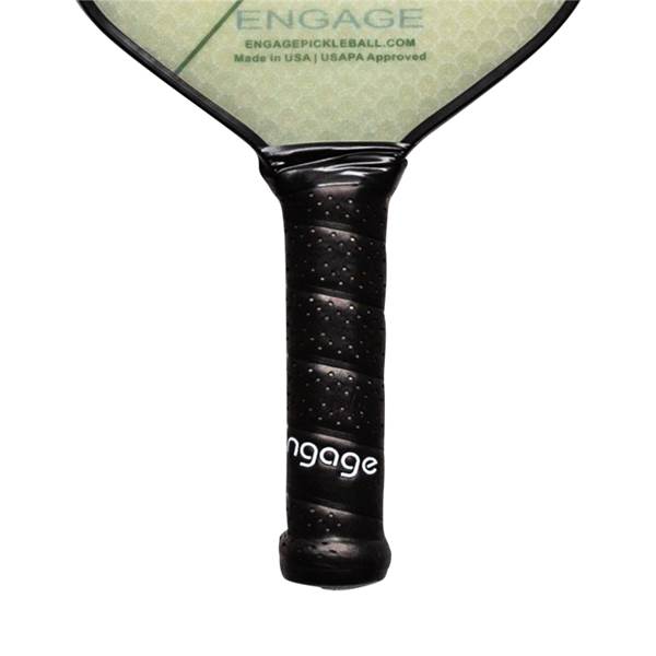 Close-up of a black pickleball paddle grip with Engage branding and textured surface.
