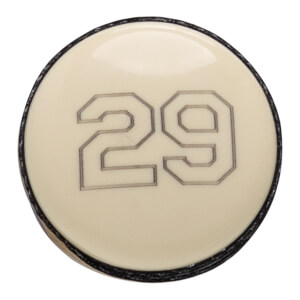 Close-up of an off-white baseball bat end cap with a black rim and the number 29 outlined in the center.