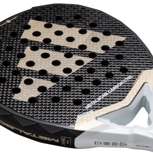 Close-up of a black and gold adidas Metalbone Carbon Ctrl 3.4 padel racket with a textured surface and visible holes.