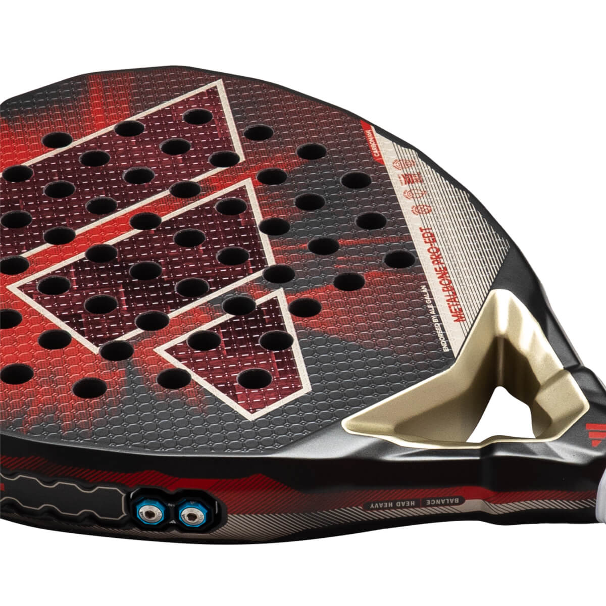 Corner view of the adidas Metalbone Pro EDT Padel Racket showing the red and black textured surface, white geometric pattern, and "METALBONE PRO-EDT" text.