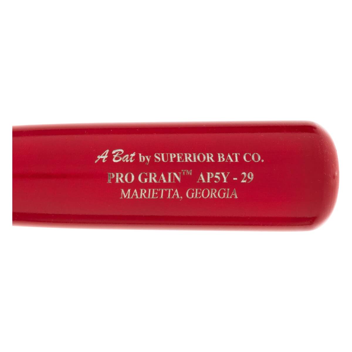 Close-up of a red baseball bat with A Bat by SUPERIOR BAT CO., PRO GRAIN™ AP5Y-29, and MARIETTA, GEORGIA printed on it.