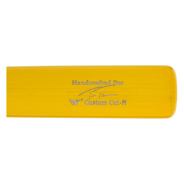 Close-up of a yellow baseball bat with Handcrafted For text, a signature, and W7 Custom Cut-M inscription.