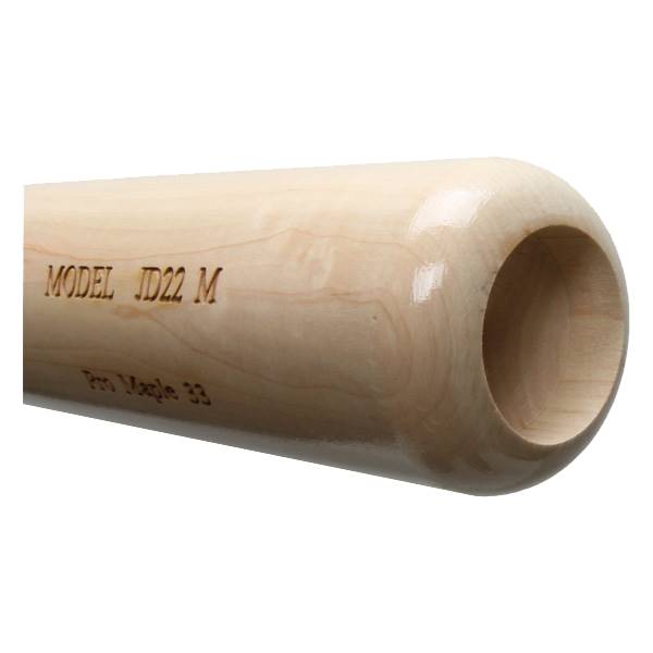 Close-up of a light wood baseball bat with MODEL JD22 M and Pro Maple 33 visible.
