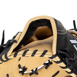 Close-up of a black and tan baseball glove with black furry wrist lining, tan trim, and black lacing.