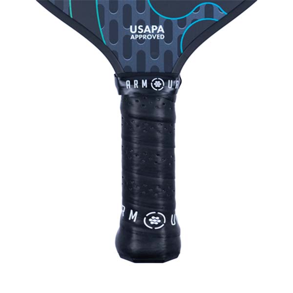 Close-up of a black pickleball paddle grip with USAPA approved text and Armour branding.