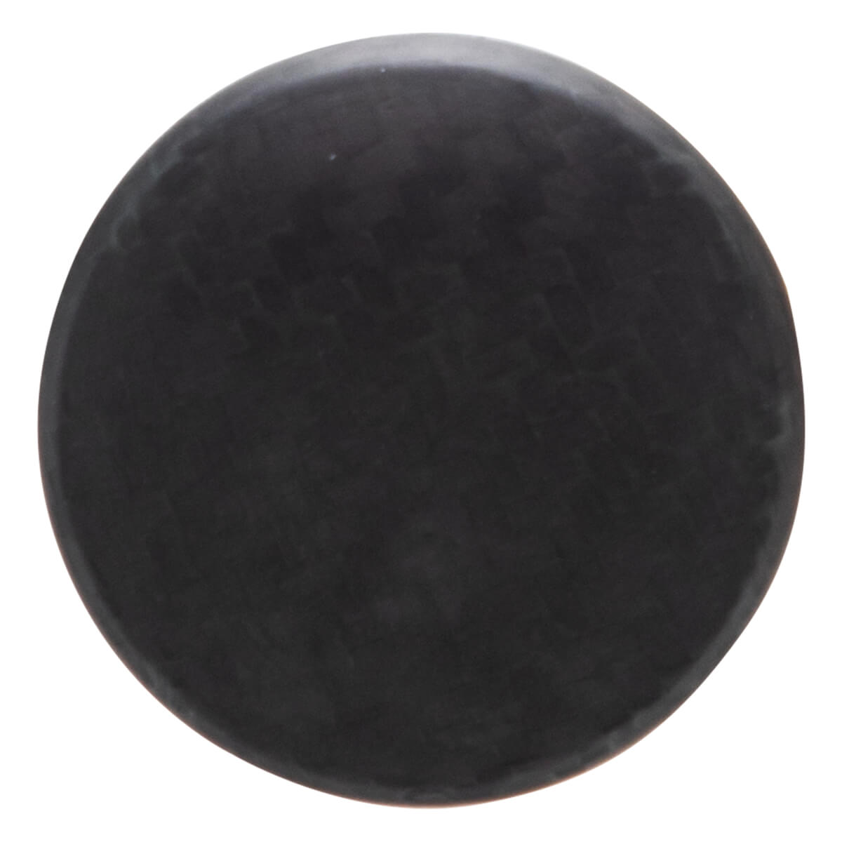 Top-down view of a black, circular puck with a matte finish.