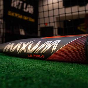 Side view of a gray baseball bat with MAXUM and ULTRA text and a red patterned design.