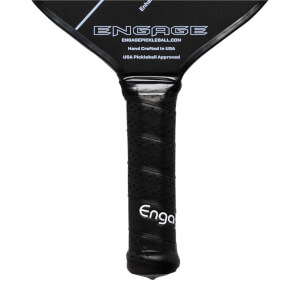 Close-up of a black pickleball paddle grip with a textured surface and Engage logo.