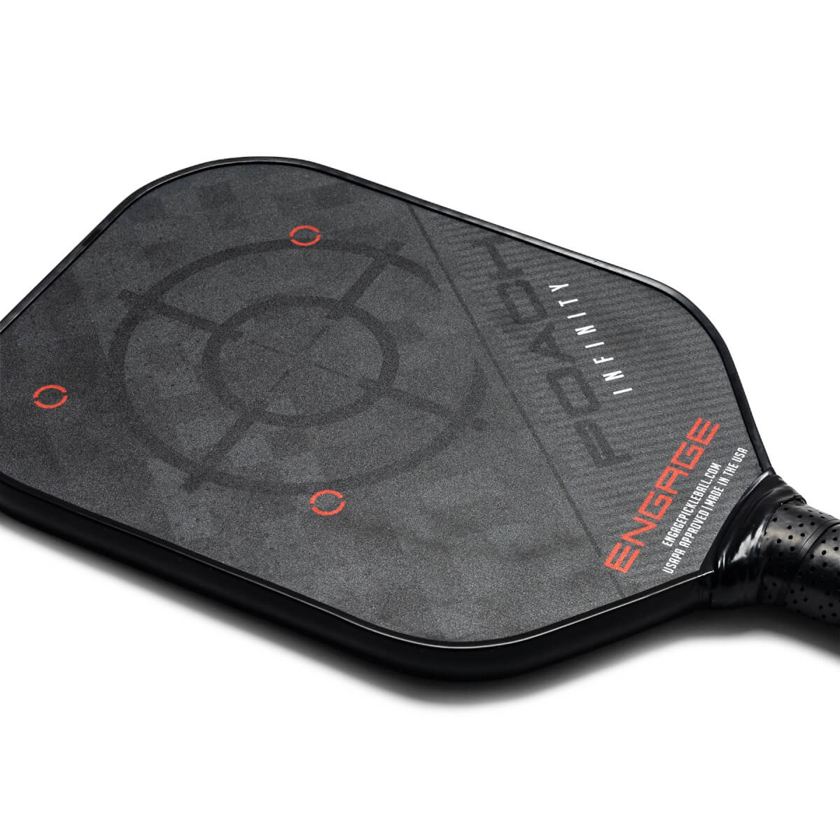 Top-down view of a black pickleball paddle with a target design and ENGAGE POACH INFINITY text.