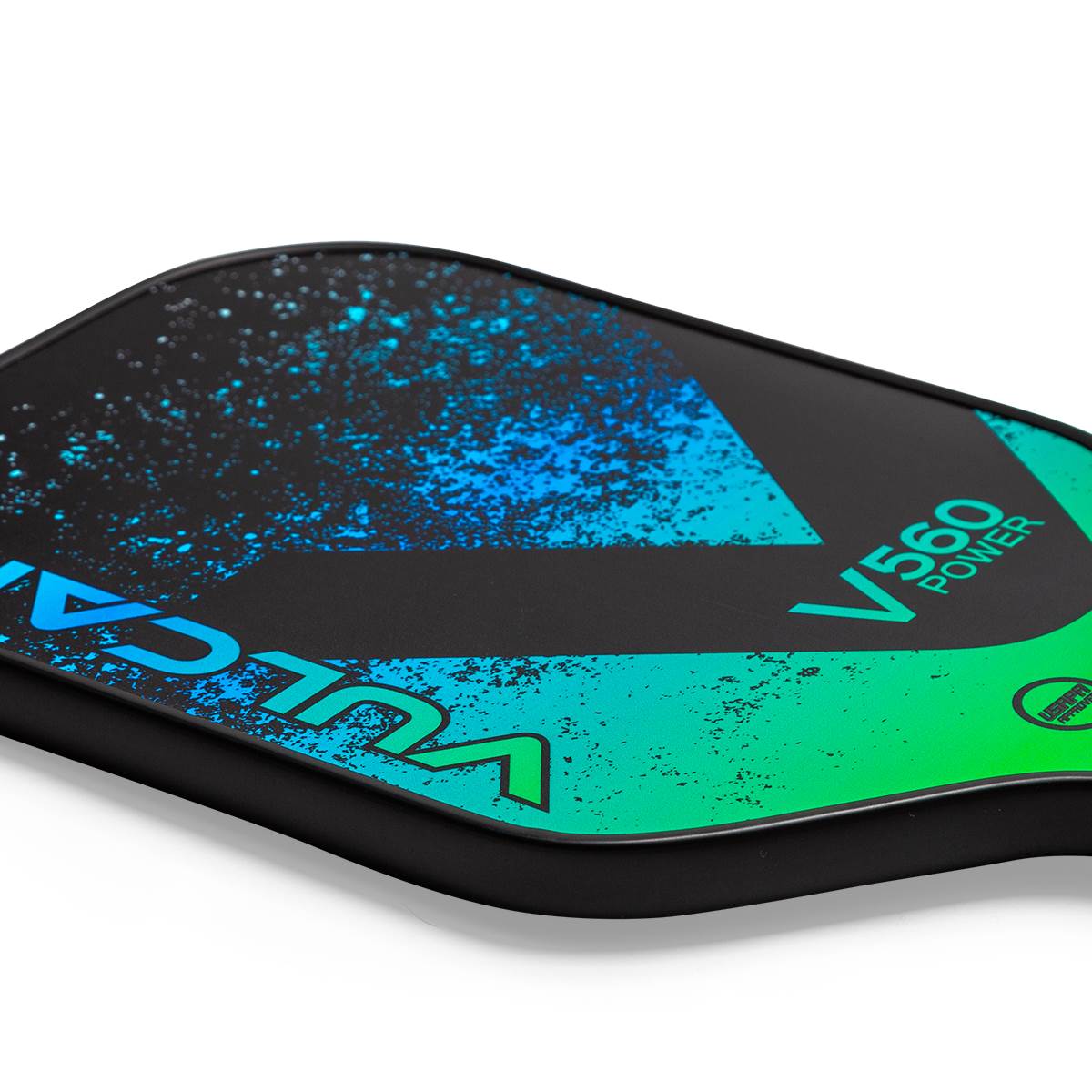 Corner view of a black pickleball paddle with blue and green splatter design, V560 POWER text.