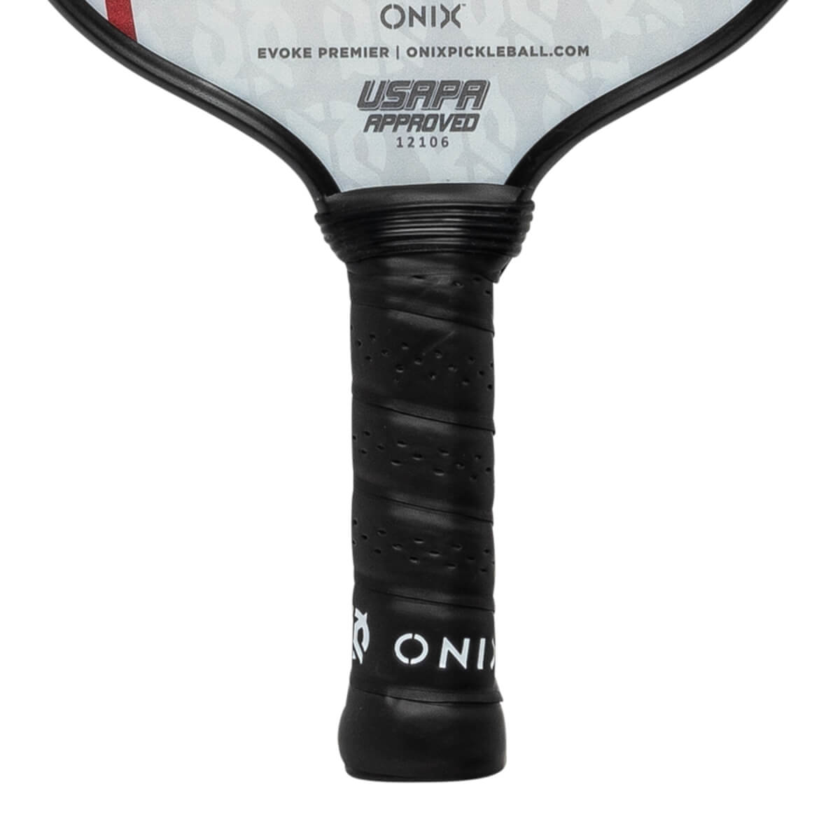 Close-up of a black pickleball paddle grip with perforations and the ONIX logo.