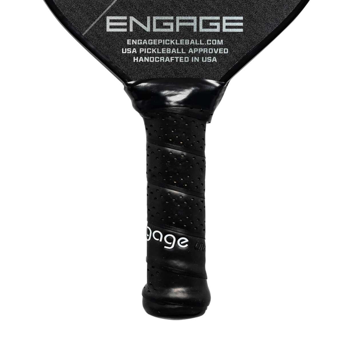 Close-up of a black pickleball paddle grip with perforations and Engage text.