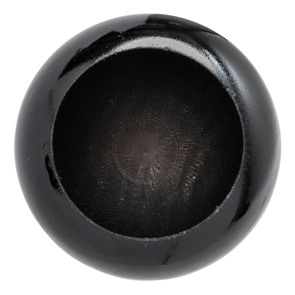 Top-down view of a black baseball bat end with a hollowed center and visible wood grain.