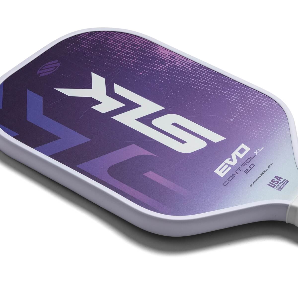 Corner view of a purple pickleball paddle with white SLK logo and EVO CONTROL XL 2.0 text.