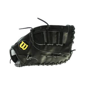 Side view of a black baseball glove with a yellow Wilson logo and white stitching.