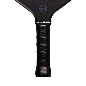 Close-up of a black pickleball paddle grip with VULCAN text and USAPA APPROVED logo.