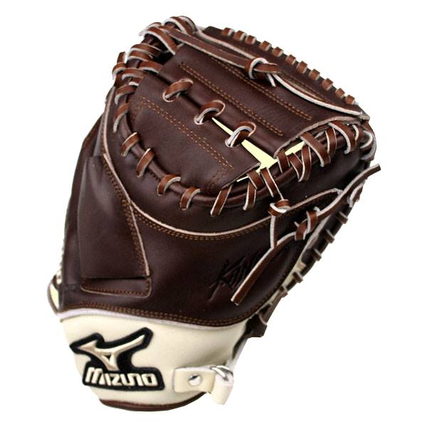 Top-down view of a brown catchers mitt with white lacing and a Mizuno logo.