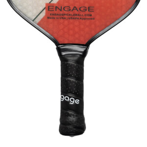 Close-up of a black pickleball paddle grip with white gage text and textured surface.