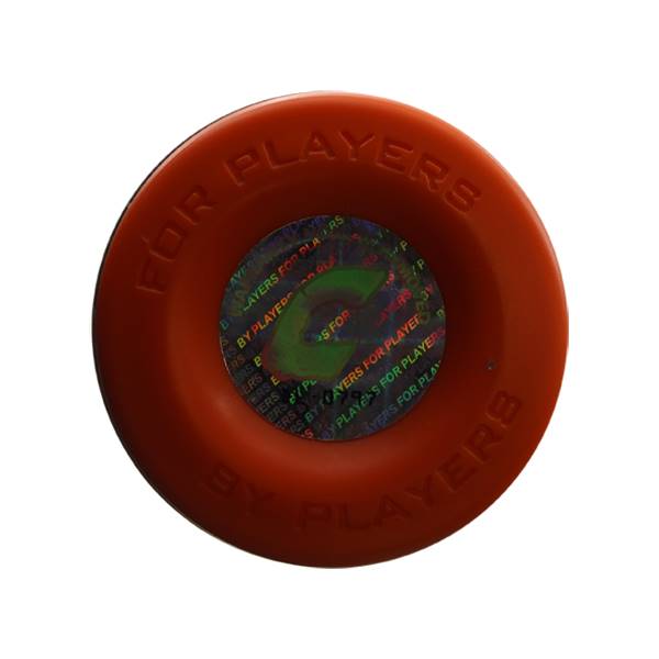 Top-down view of an orange softball bat end cap with FOR PLAYERS text and a holographic sticker.