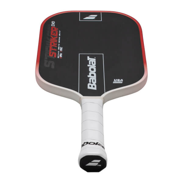Top-down view of a black pickleball paddle with red trim, featuring "STRIKER EVO" and "Babolat" logos.