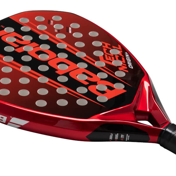 Top-down view of a red and black padel racket, showing the Babolat logo, "ORIGIN+", and circular holes.