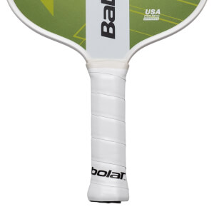 Close-up of a pickleball paddle handle with white grip tape and the "Babolat" logo.