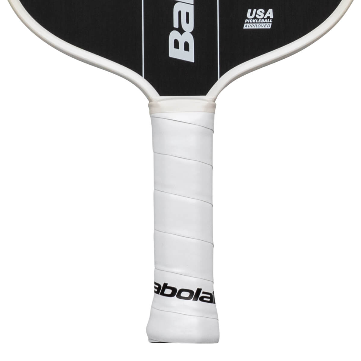 Close-up of a white pickleball paddle grip with "Babolat" and "USA PICKLEBALL APPROVED" text.