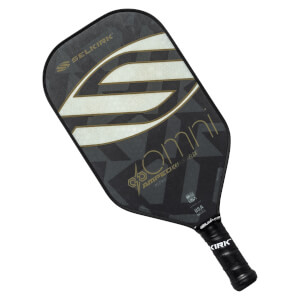 Top-down view of a black pickleball paddle with white and gold S logo, omni text, and black grip.
