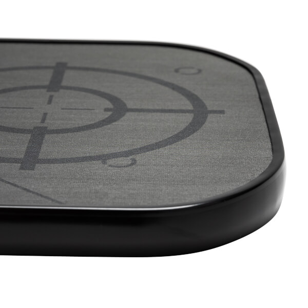 Corner view of a gray pickleball paddle with a black target design and black edge.