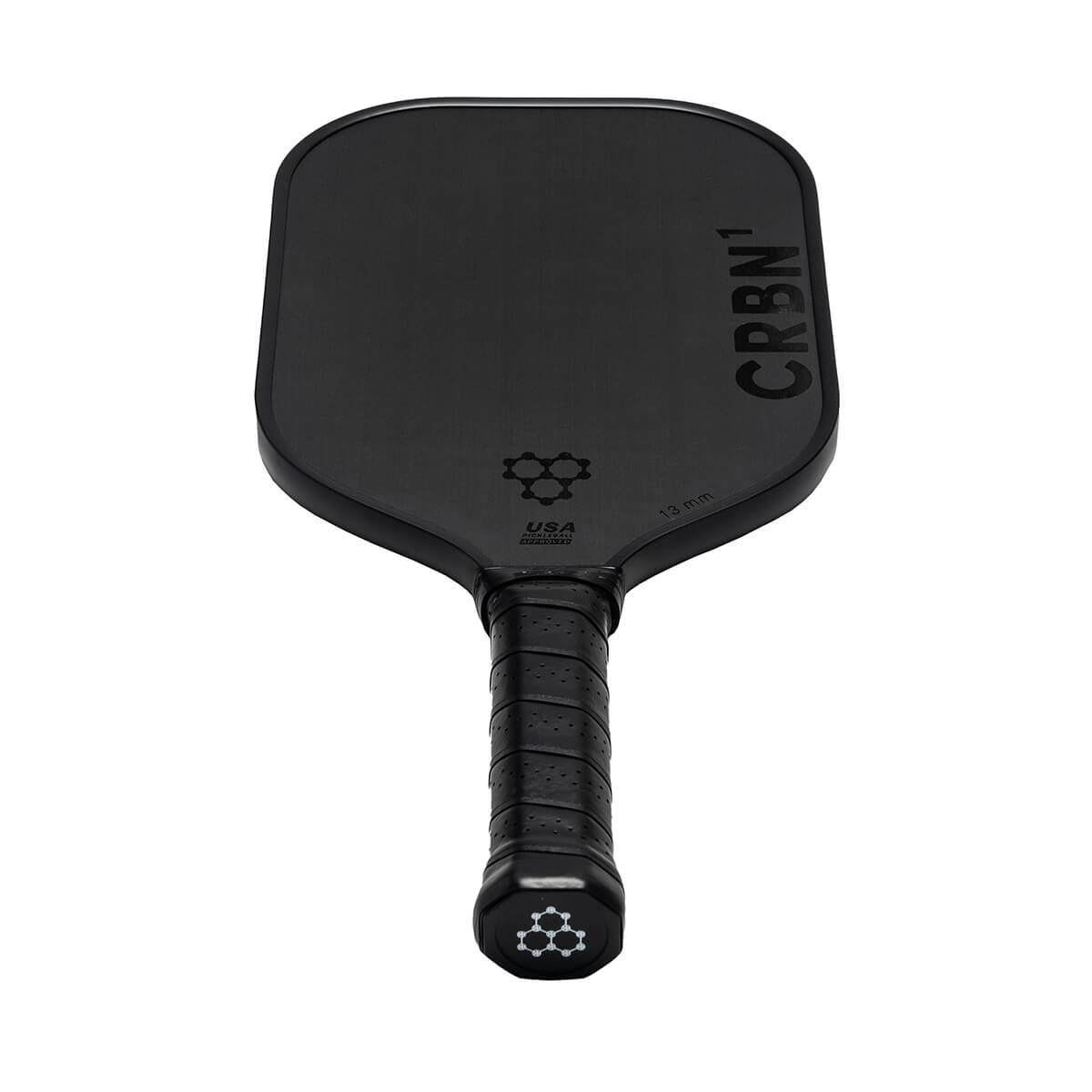 Top-down view of a black CRBN pickleball paddle with honeycomb logo and CRBN text.