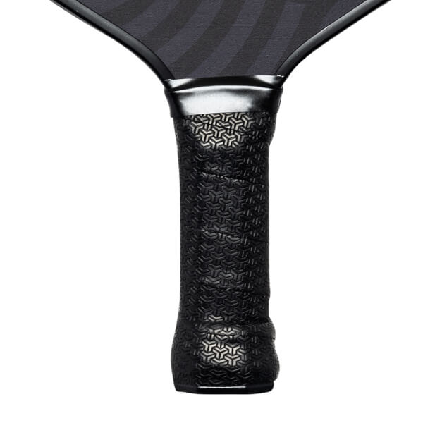 Close-up of a black pickleball paddle grip with a textured pattern and silver neck.