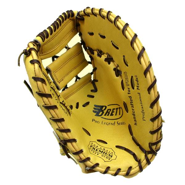 Inside view of a yellow first base mitt with Brett logo, Pro Legend Series text, and Premium stamp.