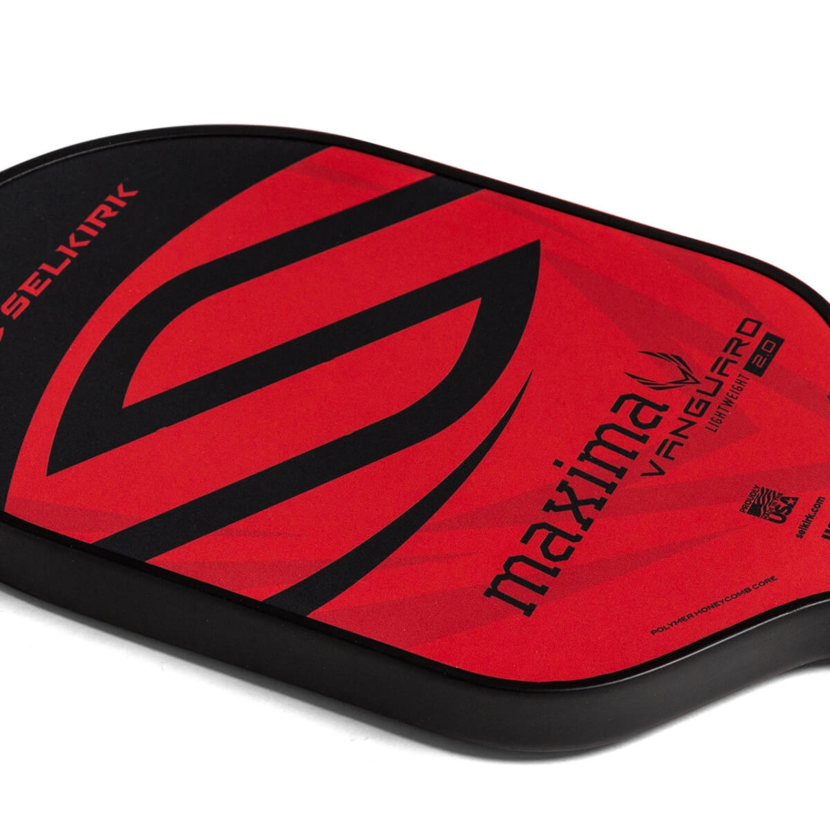 Corner view of a red and black Selkirk VANGUARD 2.0 Maxima pickleball paddle with large black S graphic.
