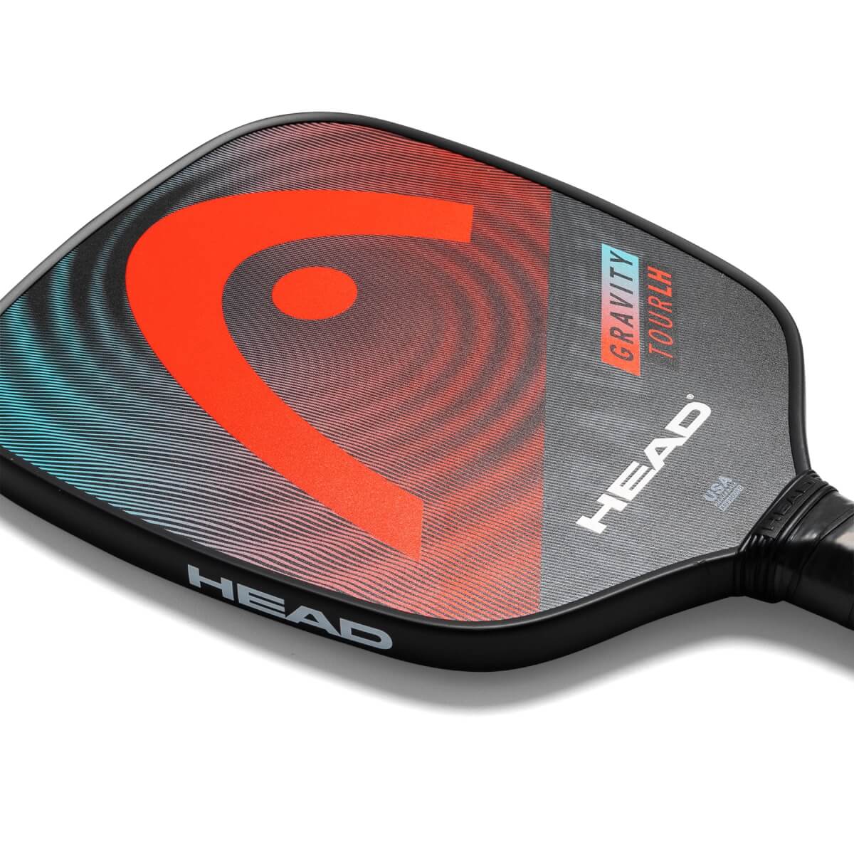 Corner view of a black pickleball paddle with a red HEAD logo and GRAVITY TOURLH text.