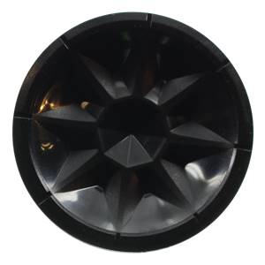 Top-down view of a black baseball bat end cap with a starburst pattern.