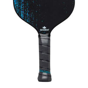 Close-up of a black pickleball paddle with blue speckle design and Diadem branding on the grip.