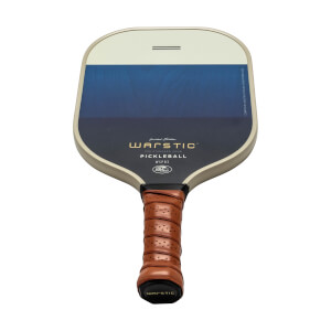 Front view of a cream and blue pickleball paddle with WARSTIC PICKLEBALL text and a brown perforated grip.