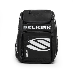 Black pickleball backpack with SELKIRK and TOUR printed in white, featuring multiple zippered compartments and mesh side pockets.