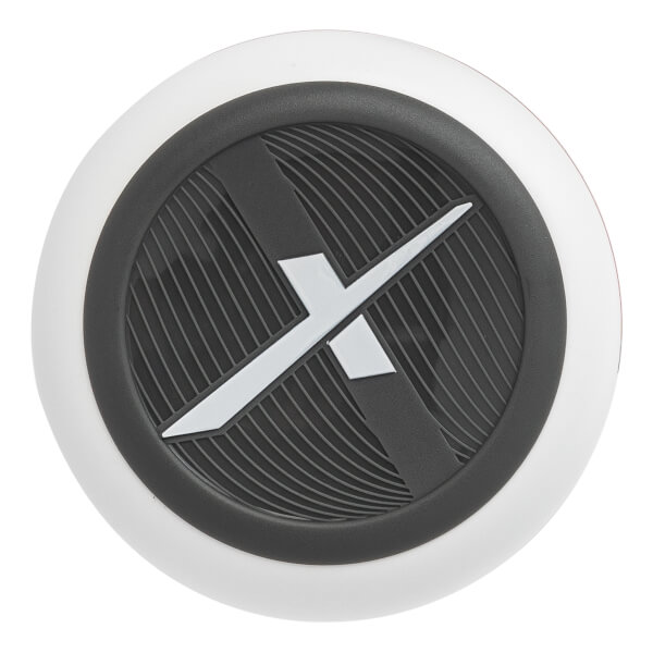 Top-down view of a white baseball bat end cap with a black and white X logo and textured lines.