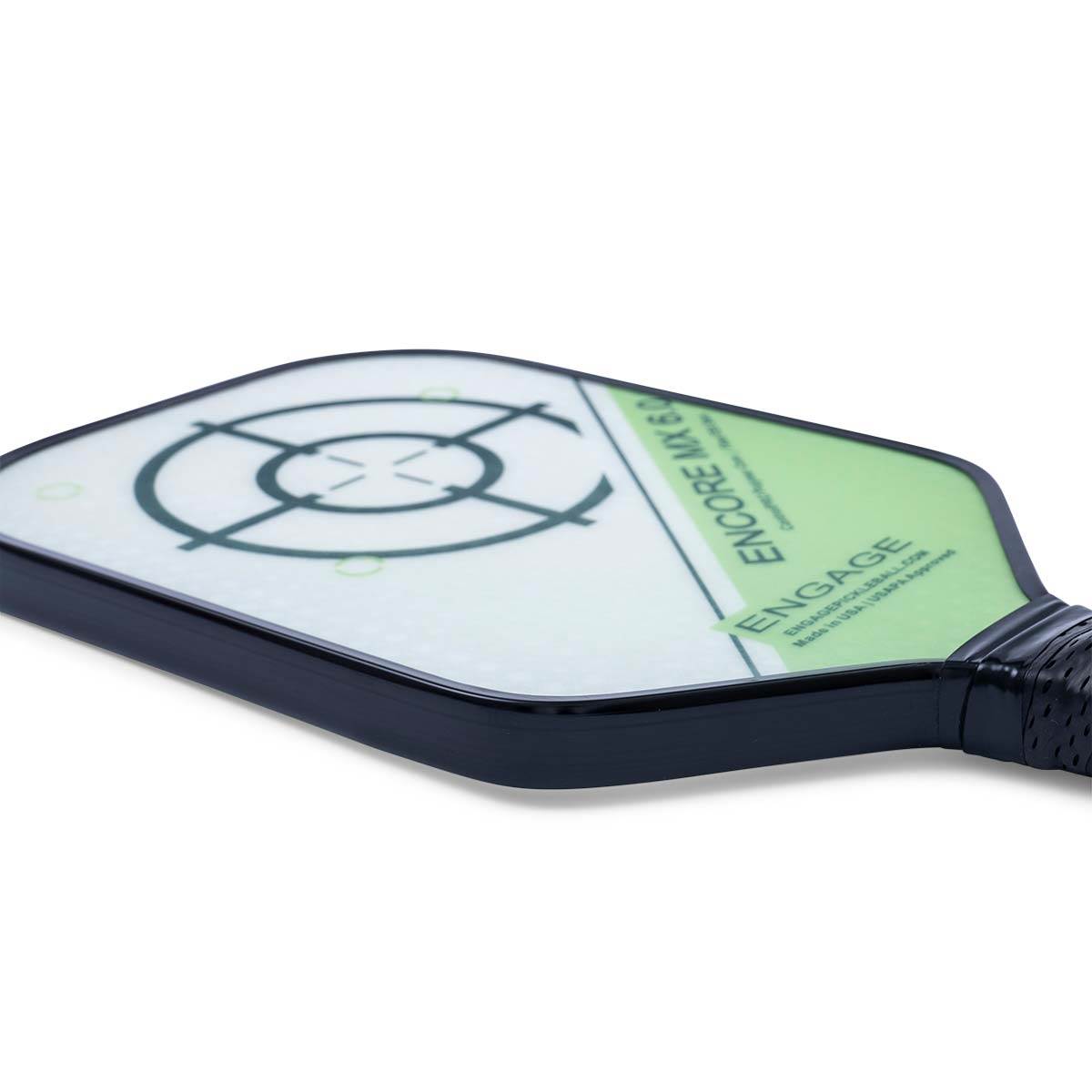 Side view of a white and green pickleball paddle with a target design and ENGAGE ENCORE MX 6.0 text.