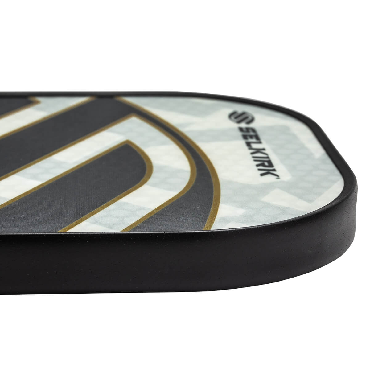 Side view of a white pickleball paddle with black and gold accents and Selkirk branding.