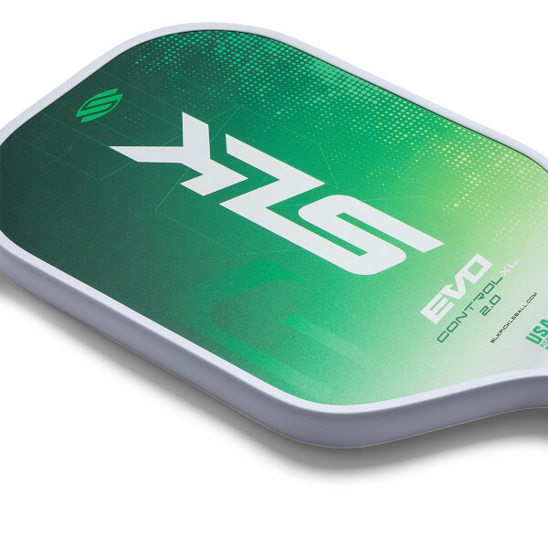 Corner view of a green pickleball paddle with white SLK logo and EVO CONTROL XL text.