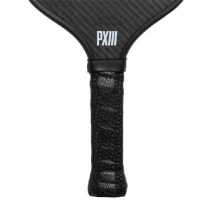 Top-down view of a black pickleball paddle with a carbon fiber surface and PXIII text.