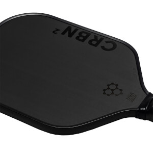 Corner view of a black pickleball paddle with CRBN² branding, a honeycomb logo, and USA Pickleball Approved text.