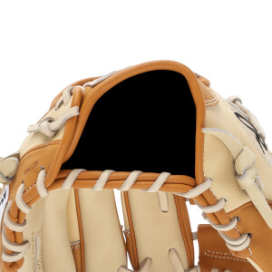 Close-up of a tan and cream baseball glove with tan lacing and a black interior pocket.