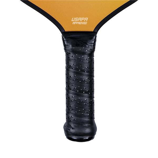 Close-up of a black pickleball paddle grip with perforated texture and USAPA APPROVED text.