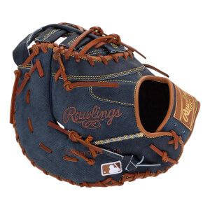 Front view of a blue denim baseball mitt with brown lacing and Rawlings branding.